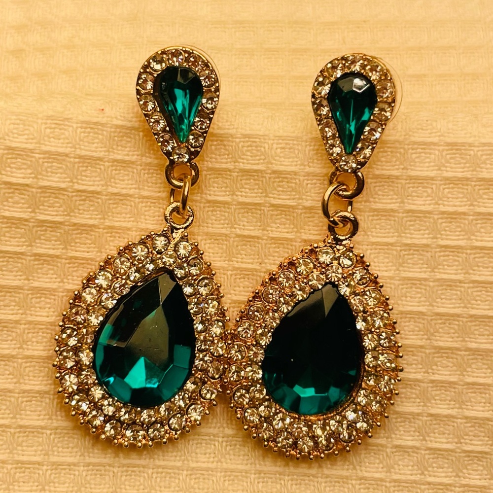 White and emerald green color stone earrings